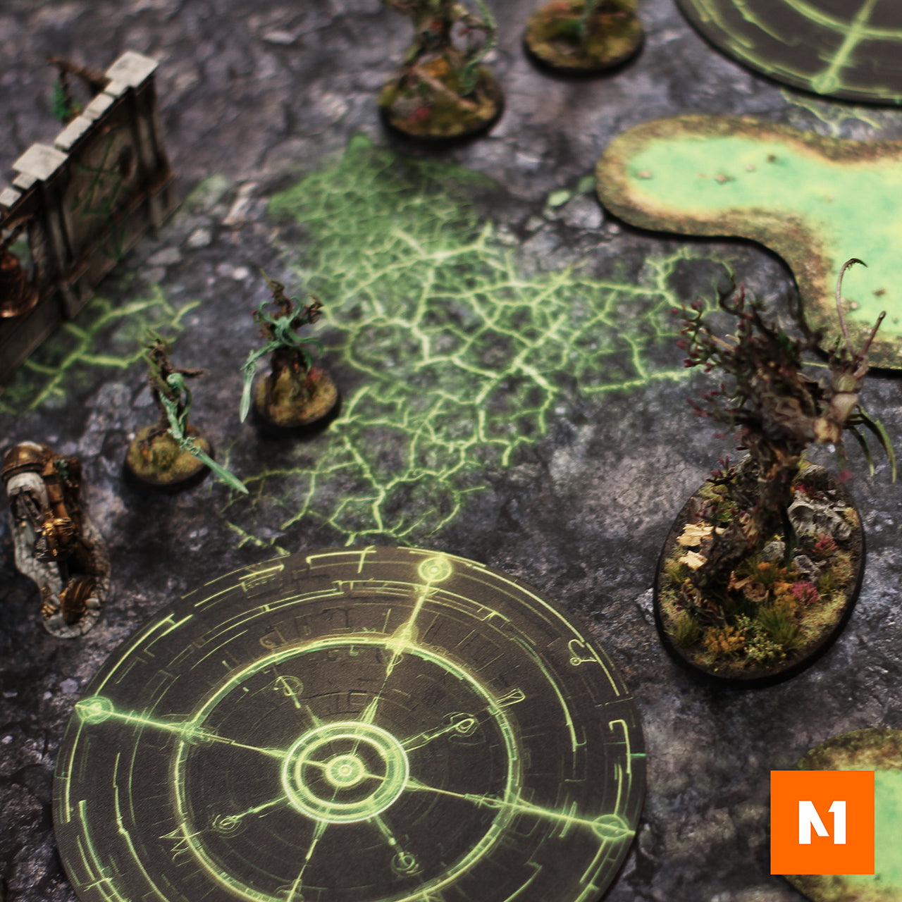 Green Blight Battlefield gaming mat with circular objective markers, miniatures and terrain for Age of Sigmar.